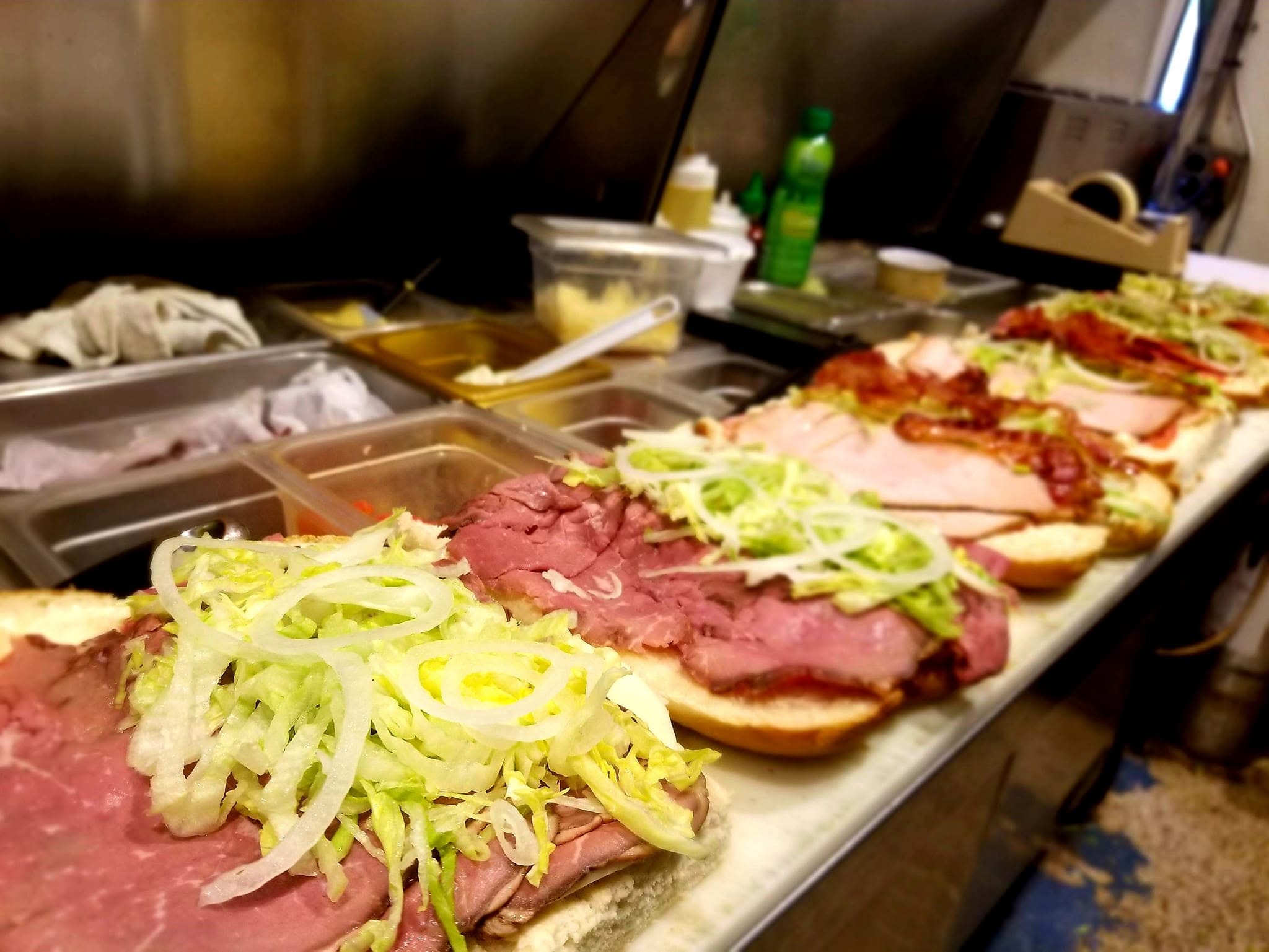 Roast beef and ham subs being built at Stus Surfside Subs